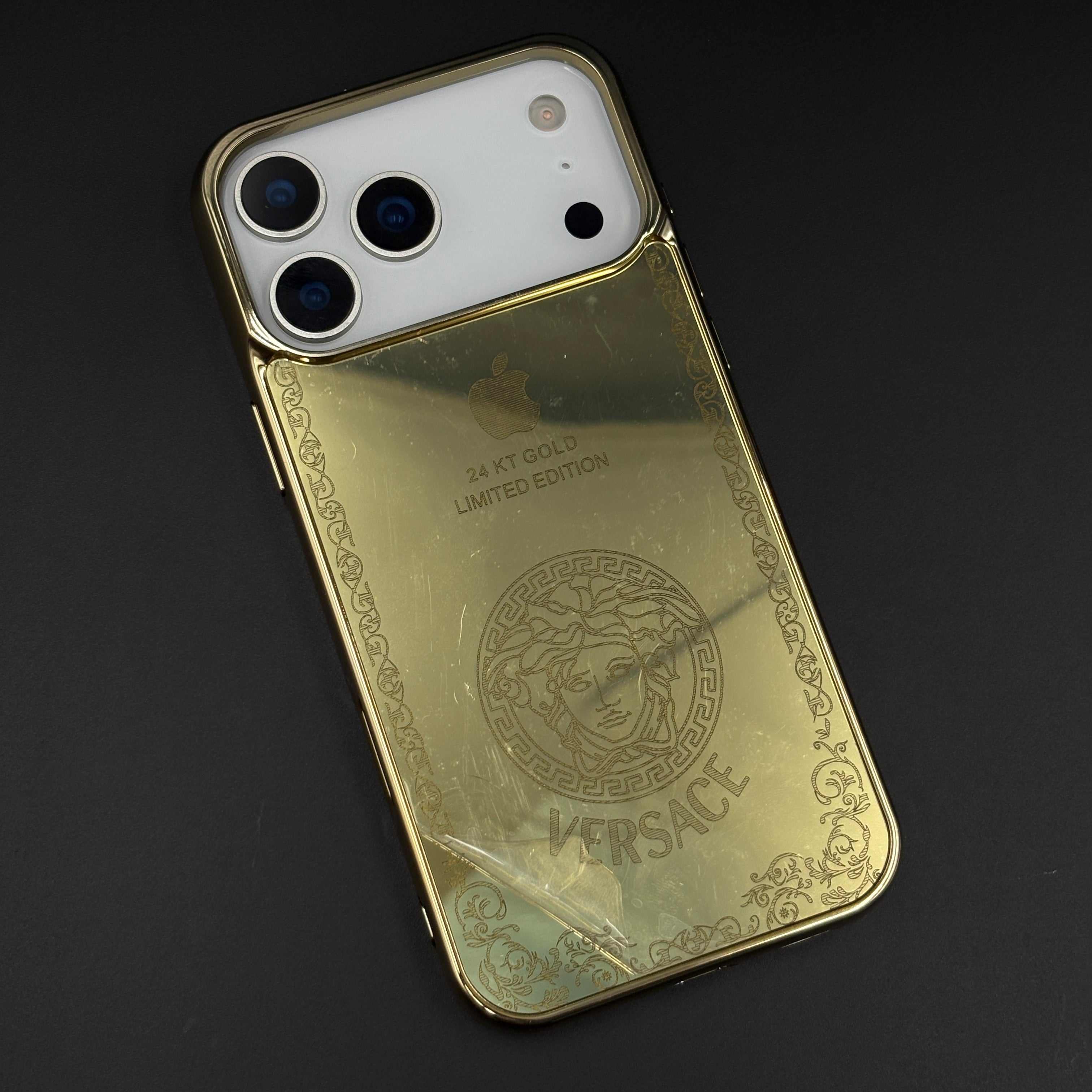 Handcrafted 24K Gold Plated Branded VS Logo Mobile Case Cover for iPhone 17 Series | Reflective Gold Finish