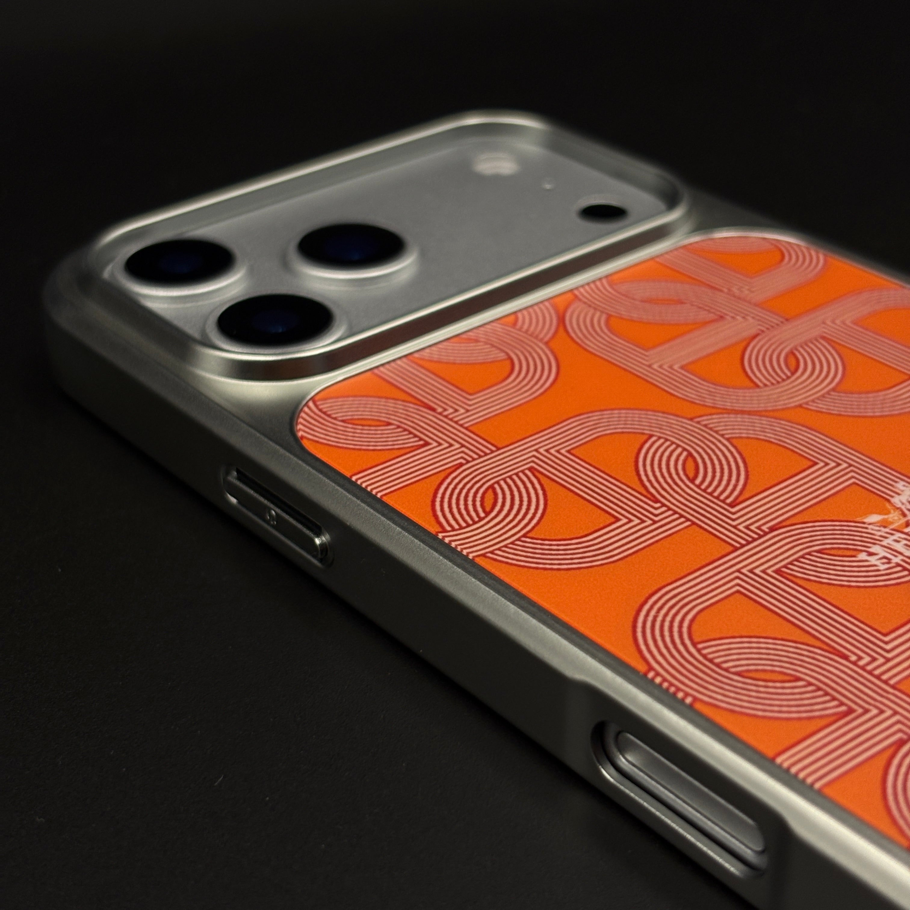 Luxury Branded Metal Initial Mobile Case Cover for iPhone 17 Series | Orange Designer-Inspired Matte Finish