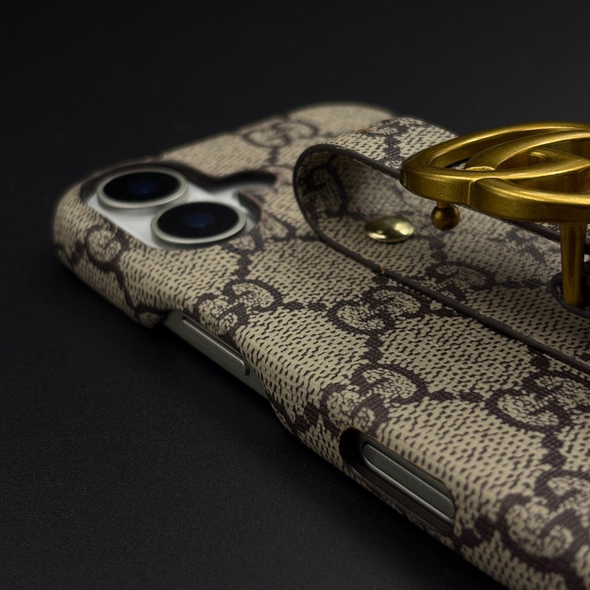 Luxury Brand GG Monogram Belt Strap Case with Gold Metal Emblem for iPhone 17