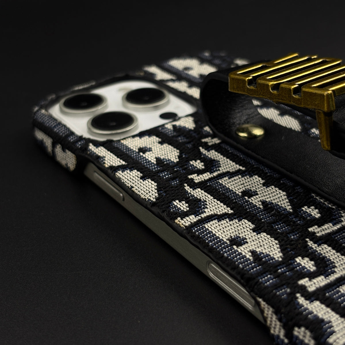 Luxury Fashion Brand Embroidered CD Belt Strap Case for iPhone 16 Series with Gold Metal Emblem