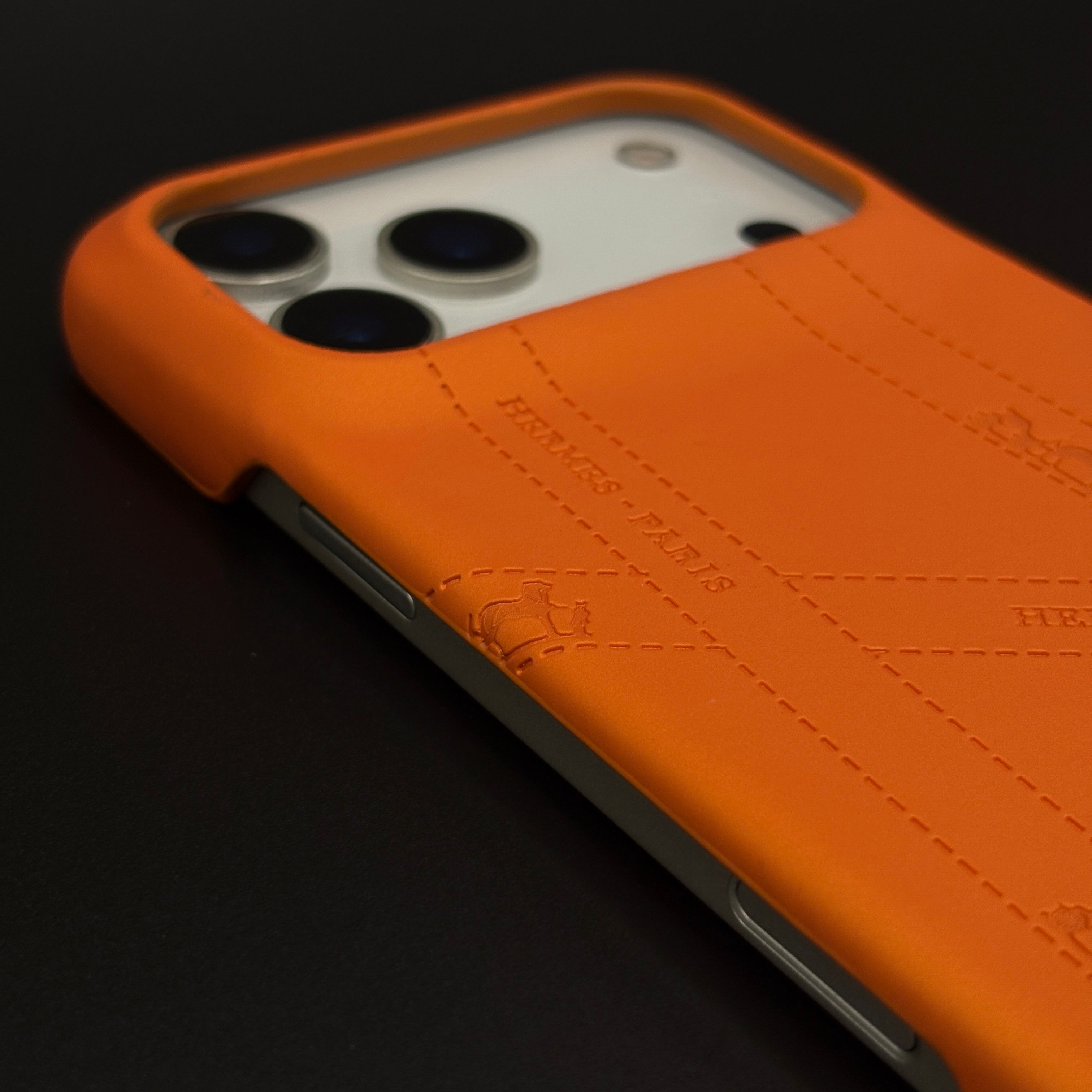 Luxury Orange Leather Case for iPhone 17 Series | HMS‑Inspired Ribbon Design with Gold H Logo