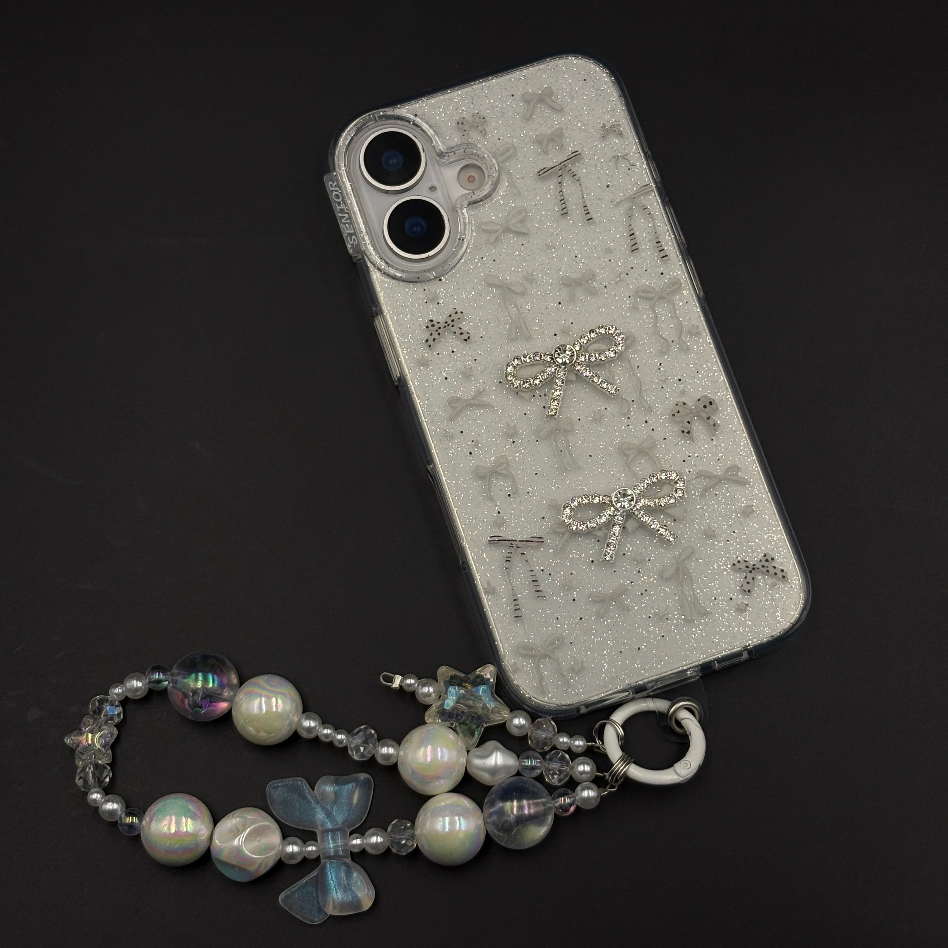 Silver Bow Sparkle Glitter Mobile Case Cover with Pearl Strap Holder for iPhone 17