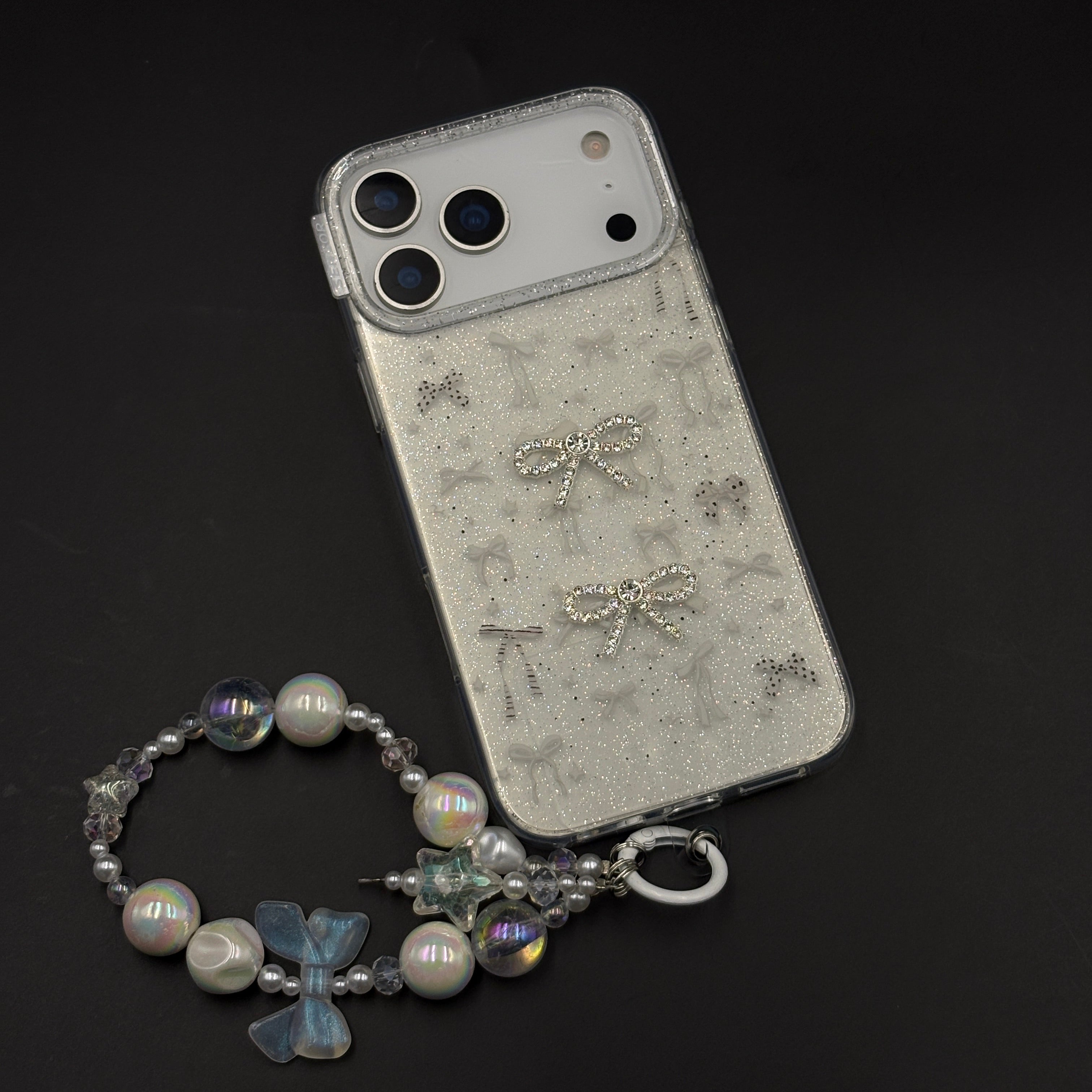 Silver Bow Sparkle Glitter Mobile Case Cover with Pearl Strap Holder for iPhone 17 Series