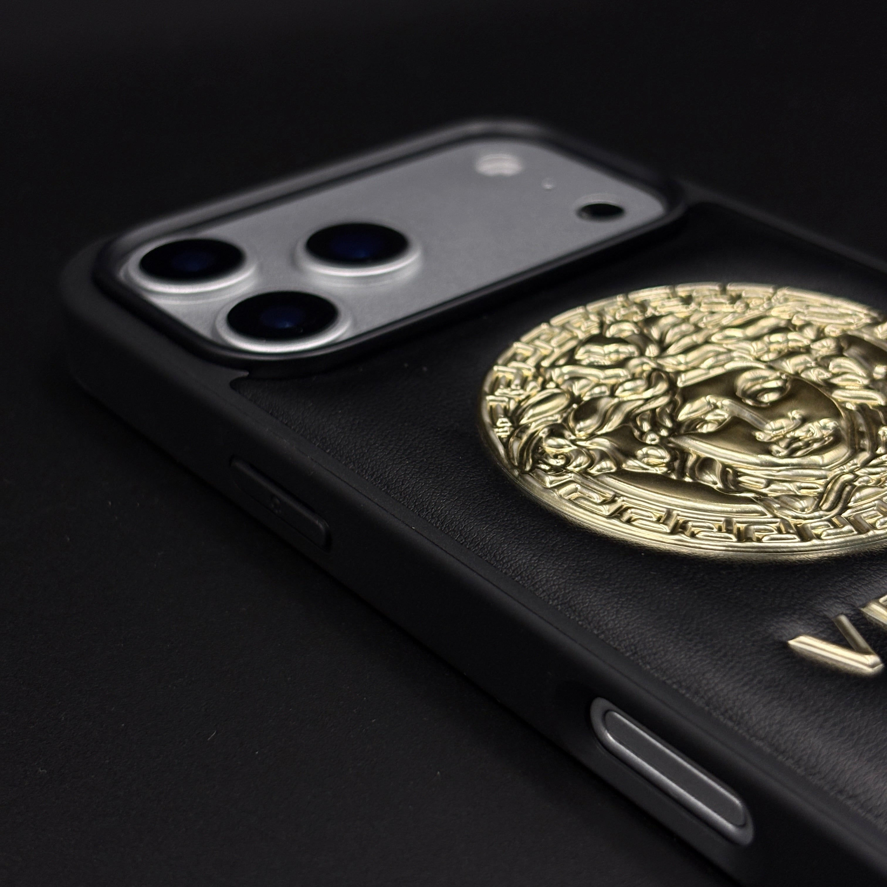 Branded VS Signature Gold Motif Mobile Case for iPhone 17 Series | Premium Black Cushion with Embossed Logo