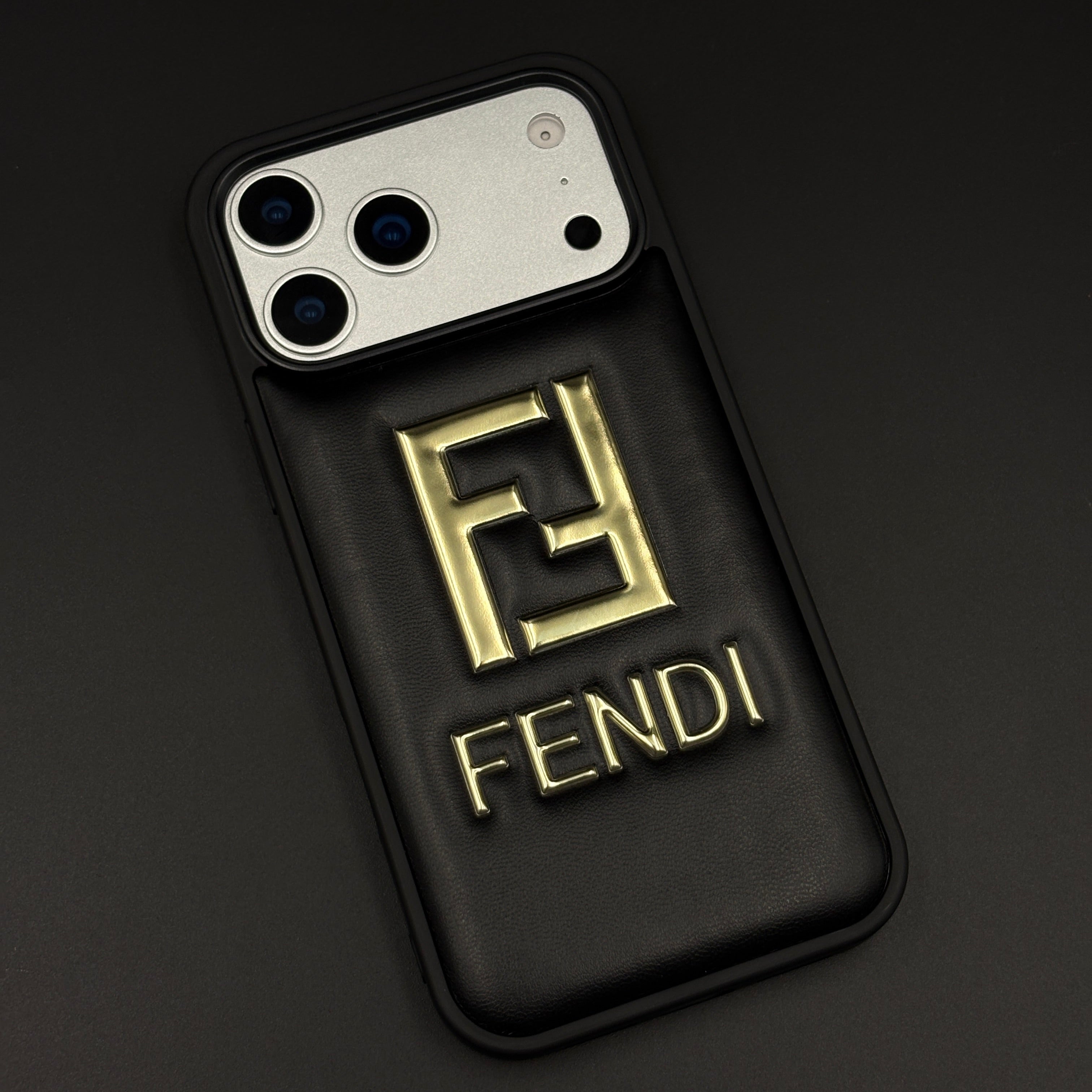 Gold Initial FF Emblem Puffer Mobile Case for iPhone 17 Series | Premium Black Cushion | Embossed Logo