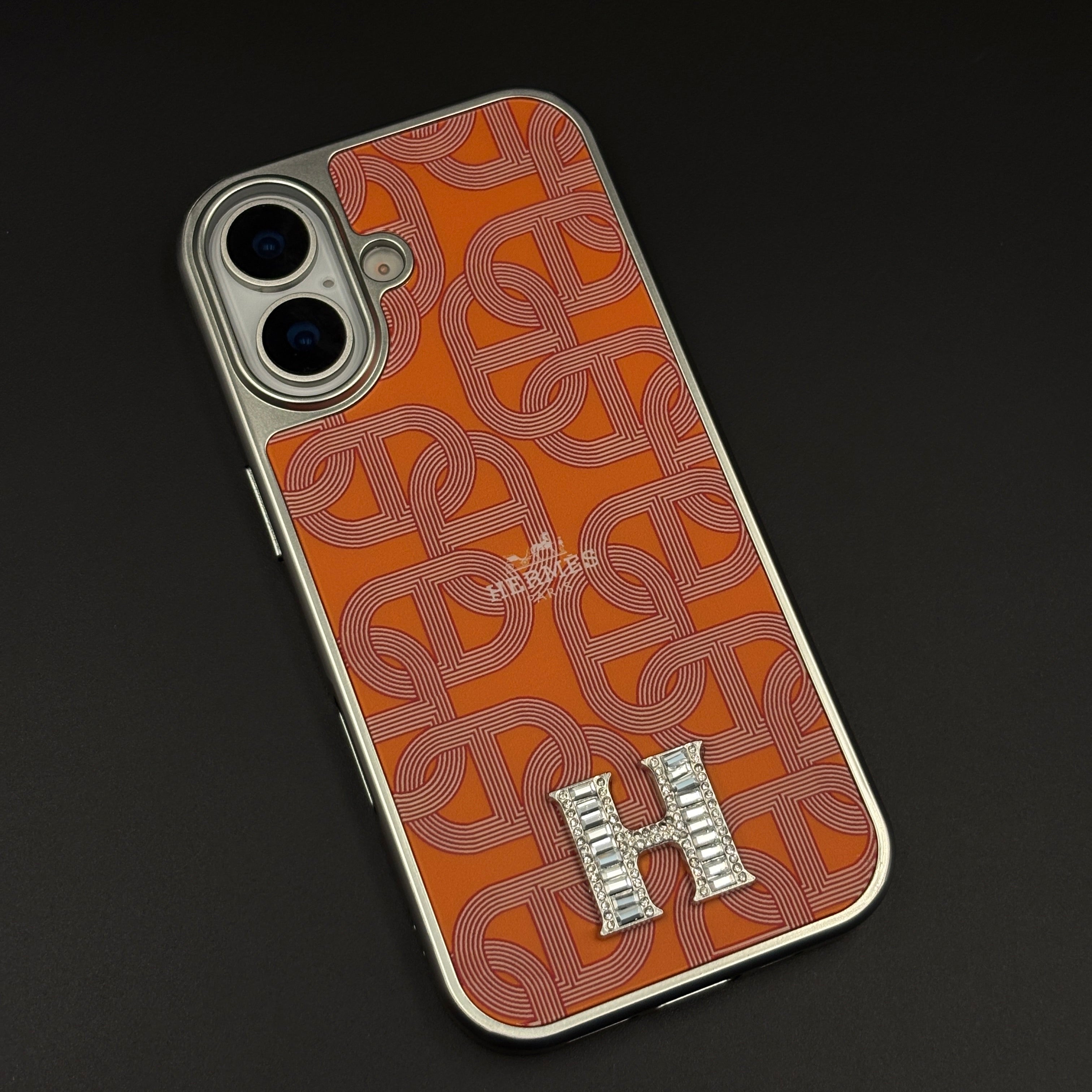 Luxury Branded Metal Initial Mobile Case Cover for iPhone 17 | Orange Designer-Inspired Matte Finish