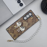 Samsung Galaxy Z Fold 6 Sea Shell Pattern Bow Diamond Pearl Strap Holder Case